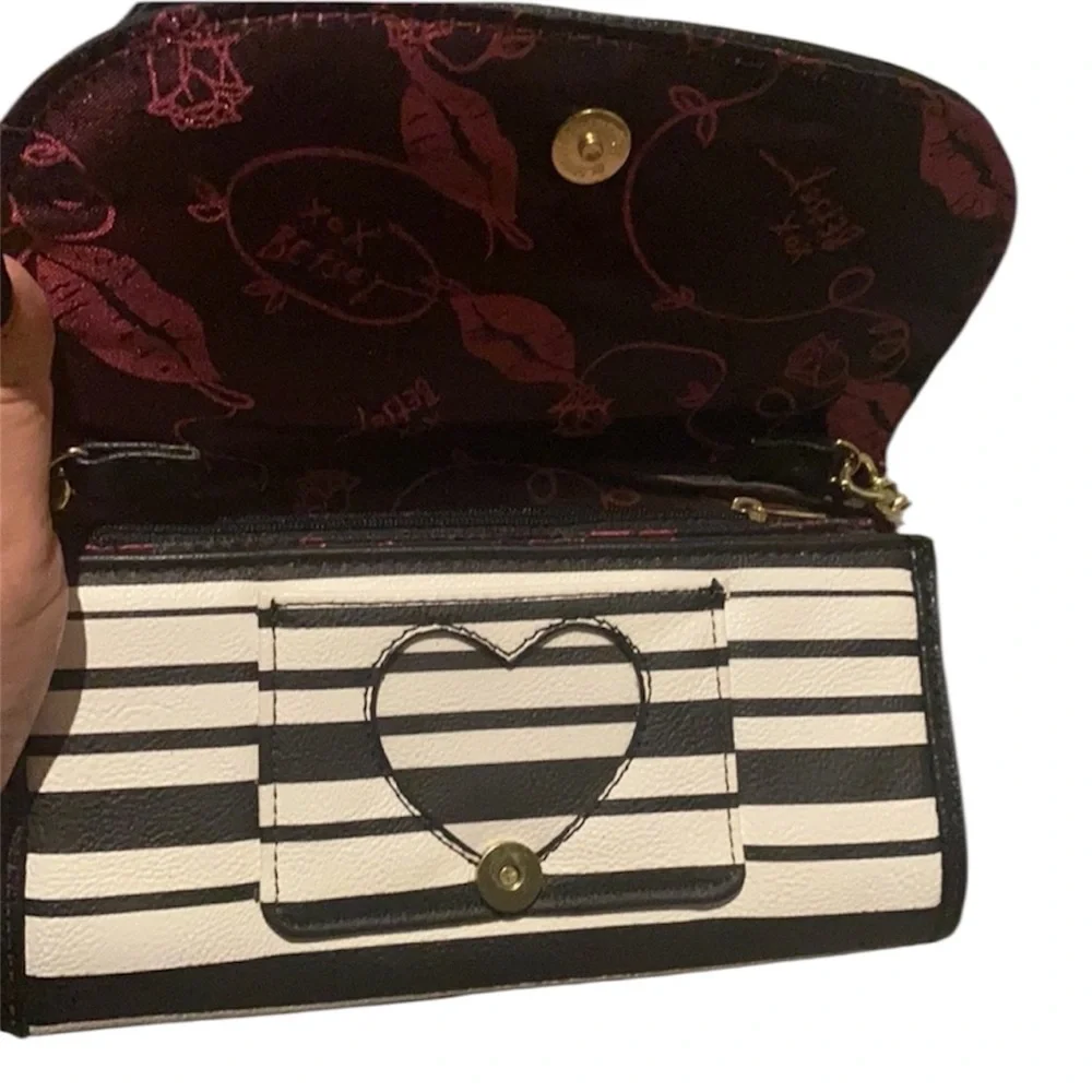 Betsey Johnson Black and White Striped Crossbody Bag with Pink Tassel